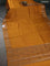 Chiniya silk saree dark mustard and rust shade with plain body and woven border