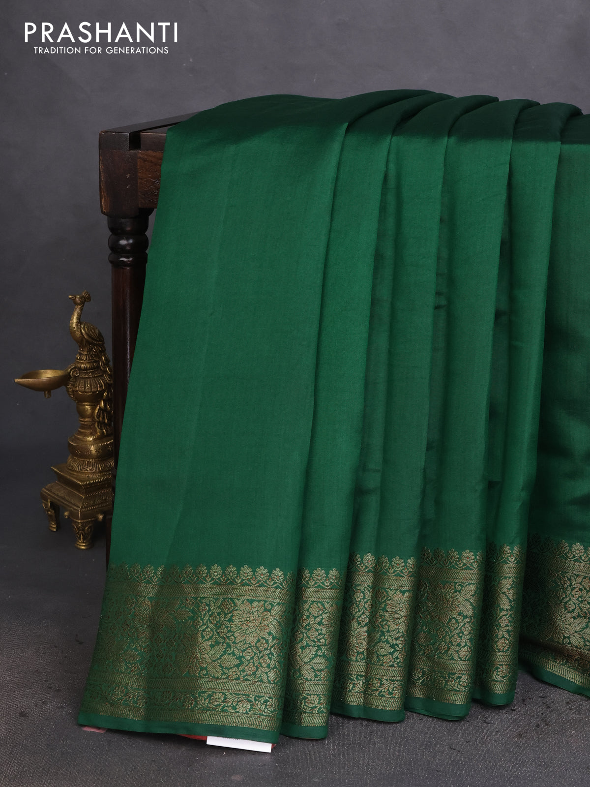 Chiniya silk saree green and rust shade with plain body and woven border