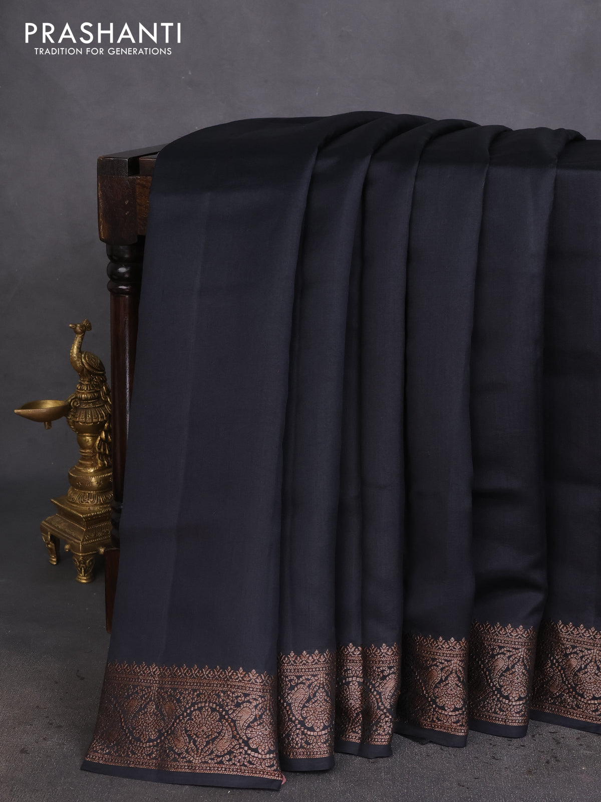 Chiniya silk saree black and maroon with plain body and woven border