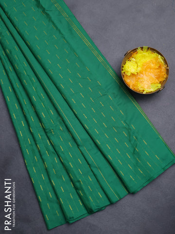 Arani semi silk saree green with zari woven buttas in borderless style