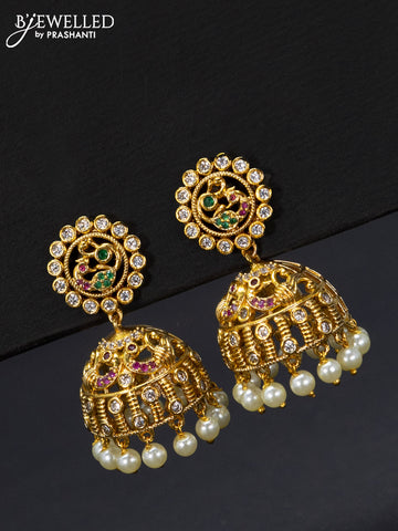 Antique jhumka peacock design with kemp & cz stones and pearl hangings