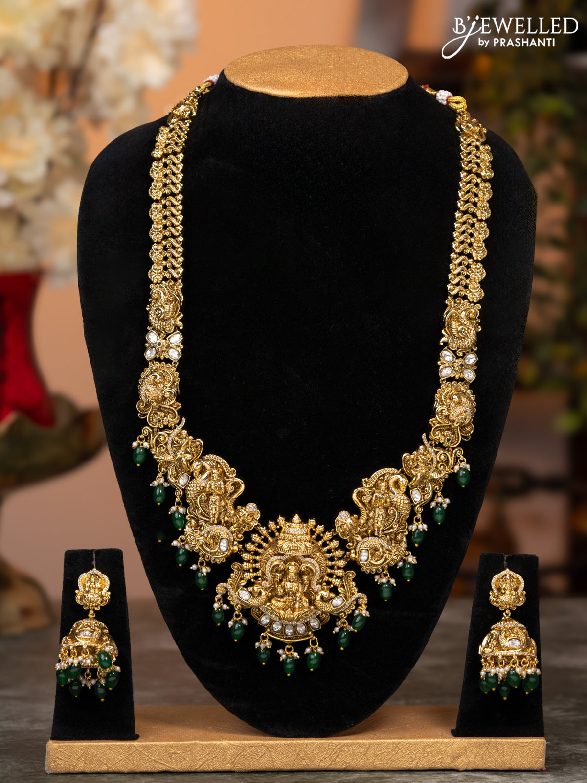 Antique haaram lakshmi design with kundan & cz stones and green beads hangings