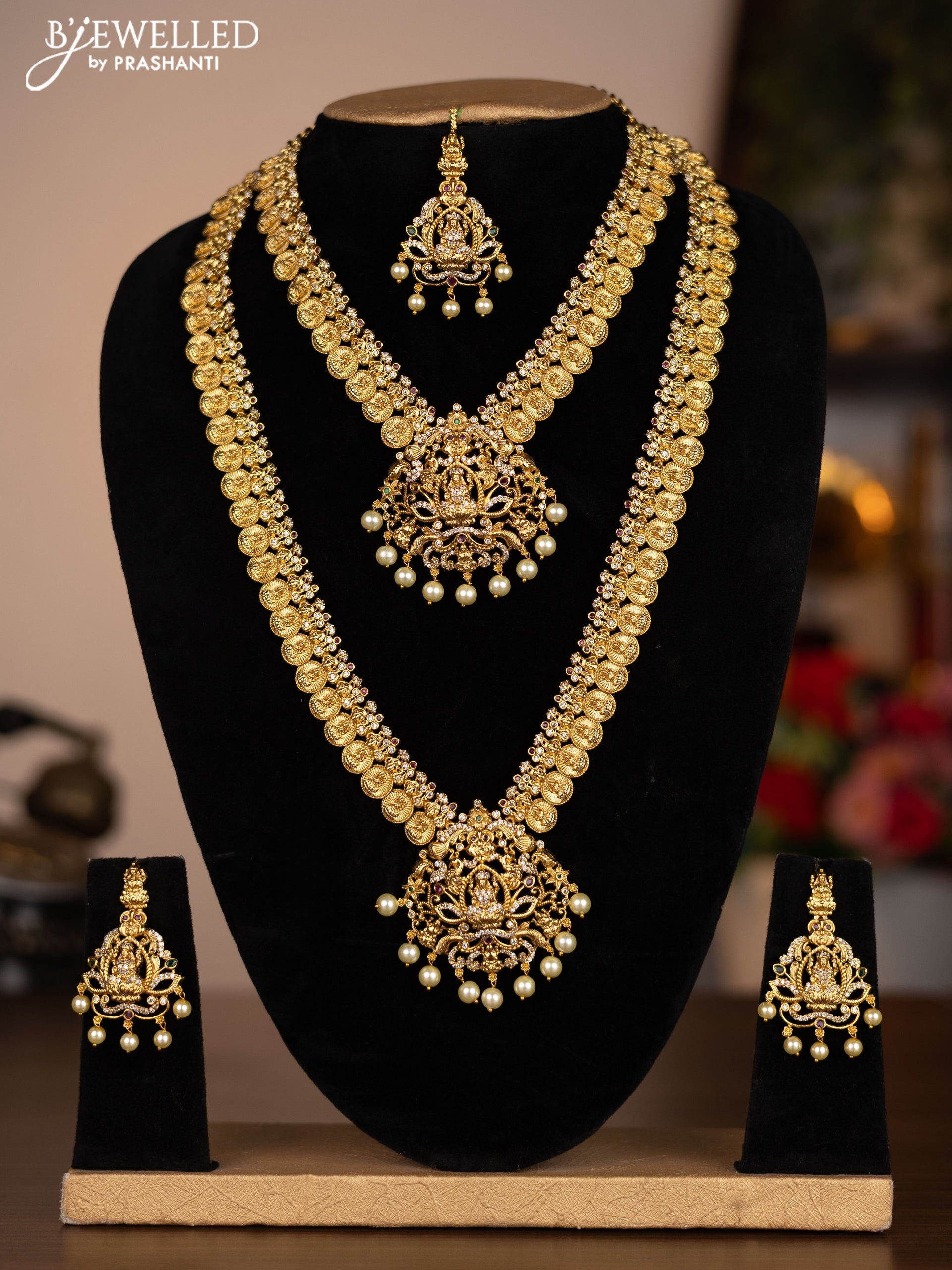 Antique combo set lakshmi design with kemp & cz stones and pearl hangings