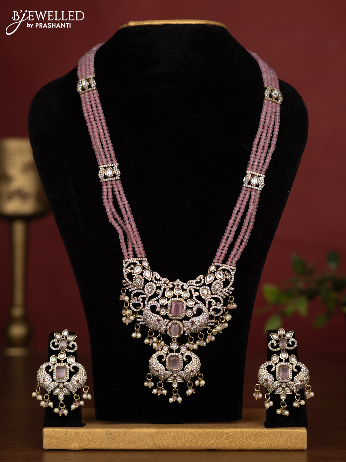 Beaded triple layer baby pink necklace with kundan & cz stones and pearl & beads hanging in victorian finish