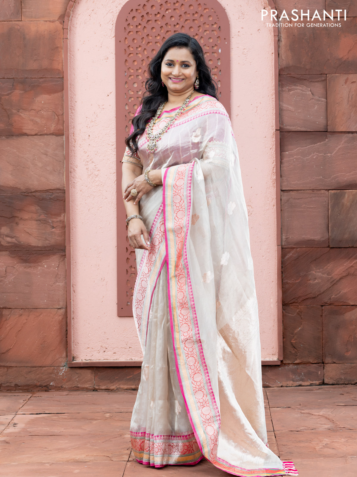 Banarasi tissue organza silk saree off white and pink with zari woven buttas and banarasi style border