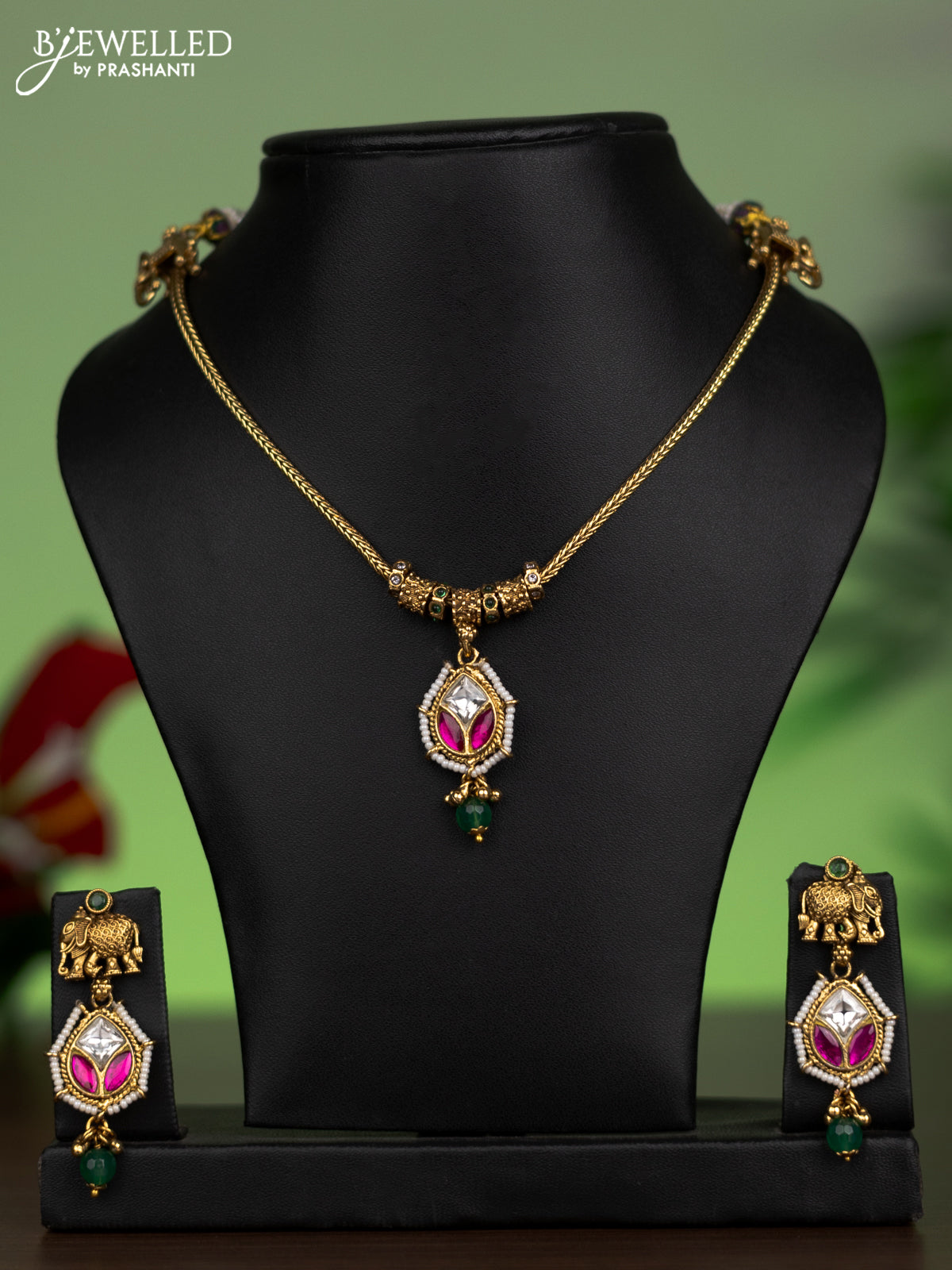 Antique attigai necklace elephant design with pink kemp & kundan stones and green beads hanging
