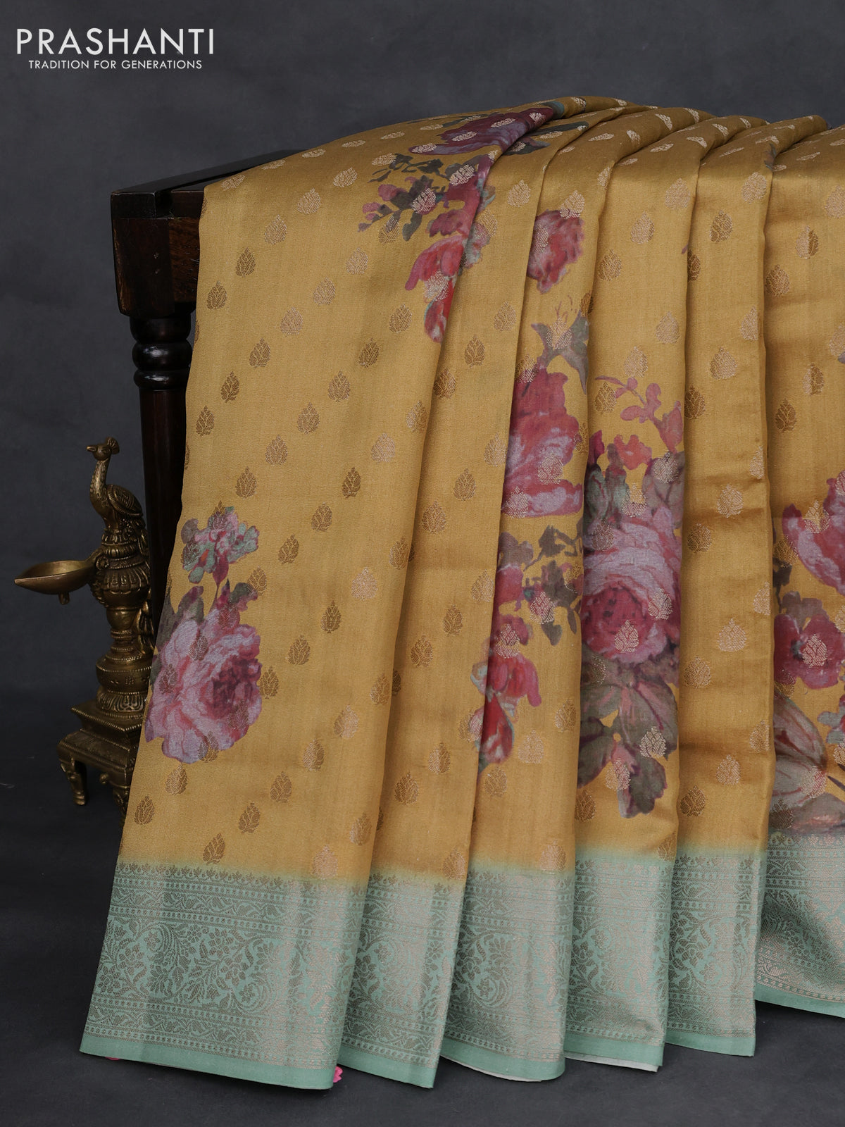 Chiniya silk saree dark mustard and pastel blue shade with allover woven buttas & floral digital prints and zari woven border