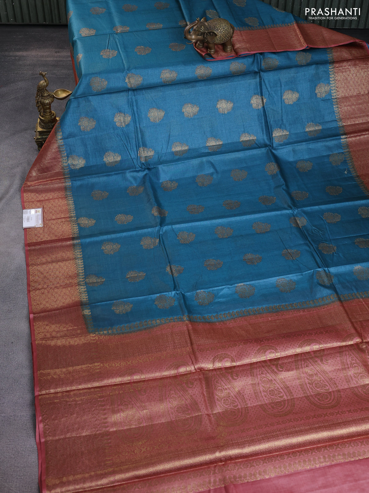 Banarasi tussar silk saree peacock blue and rust shade with thread & zari buttas and banarasi style border
