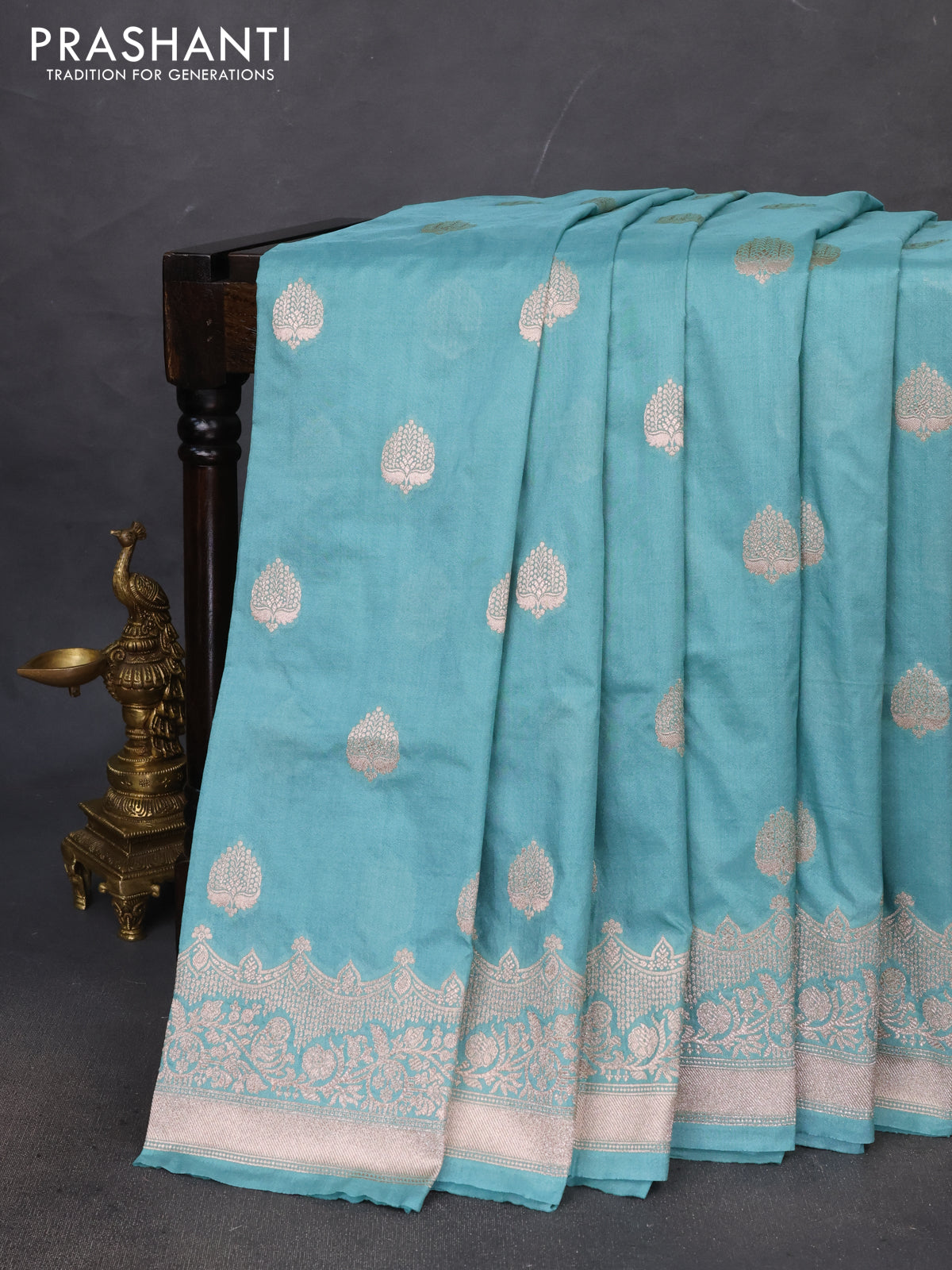 Banarasi semi katan saree pastel green with zari woven buttas and zari woven border