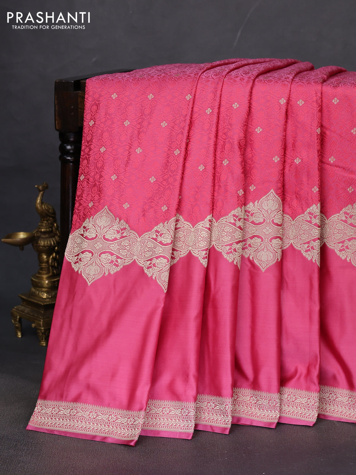 Banarasi semi mushru silk saree pink shade with allover self emboss & zari buttas and rettapet zari woven border