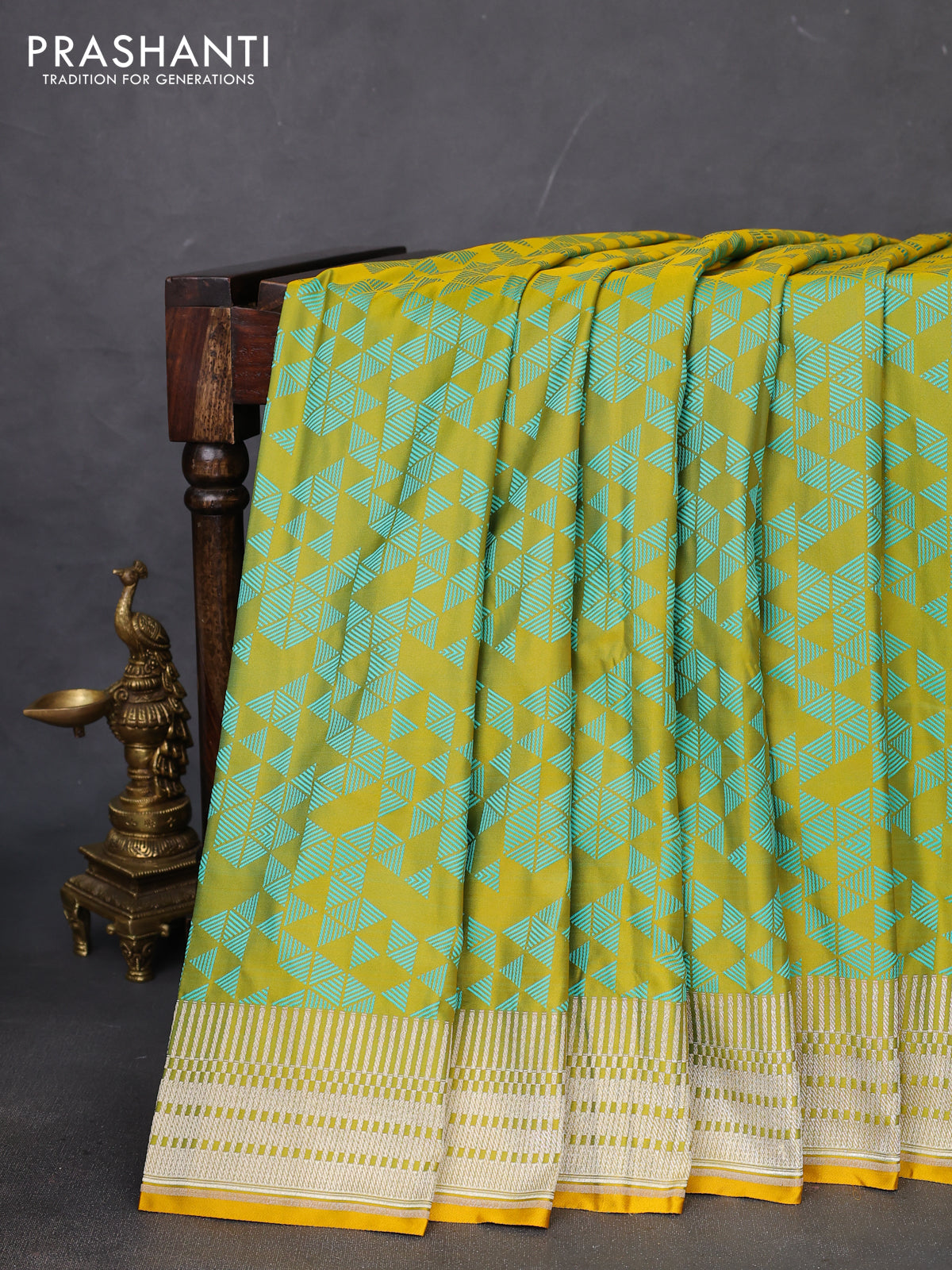 Banarasi semi mushru silk saree dual shade of mustard and teal green shade with allover self emboss and zari woven border