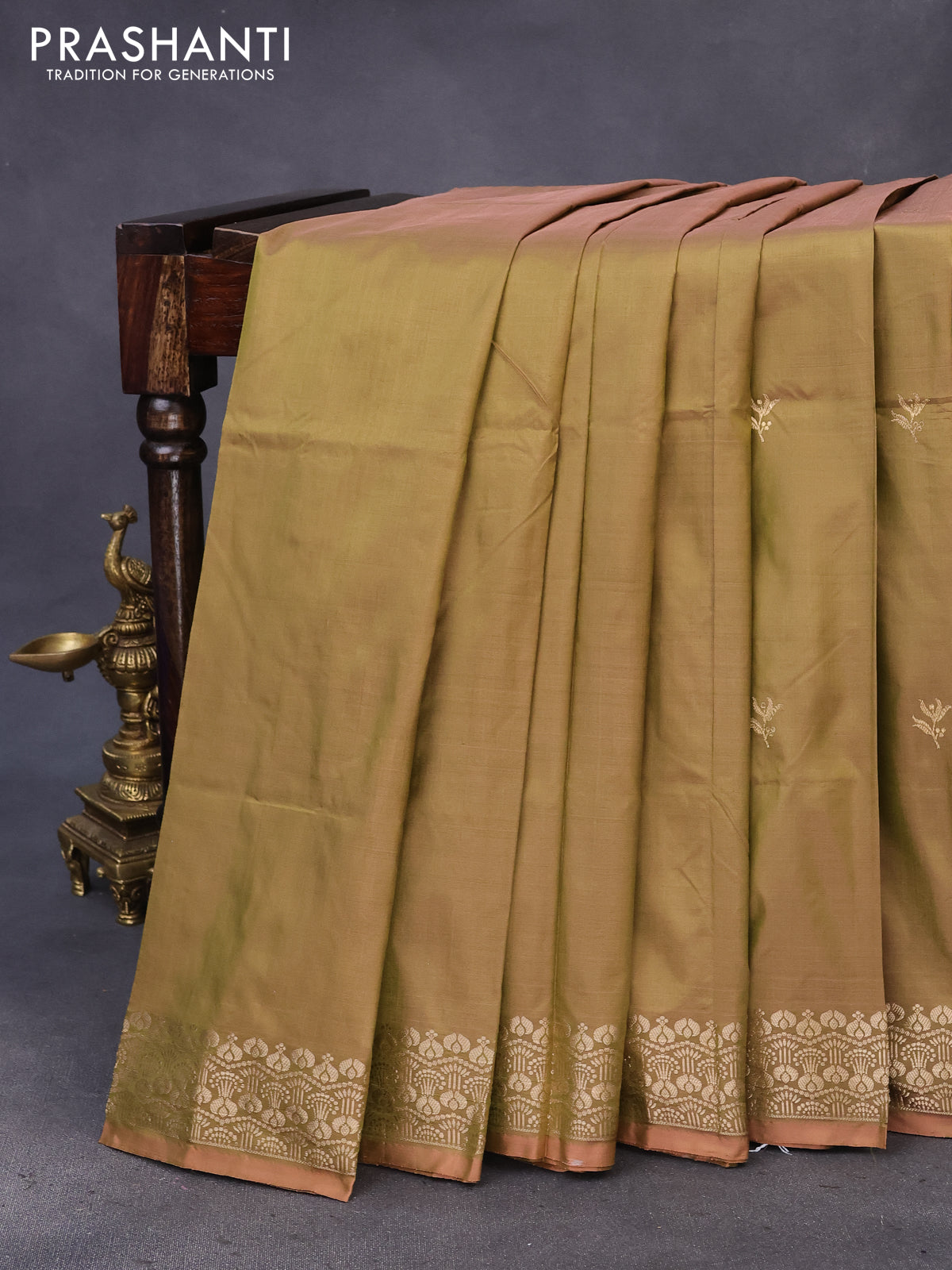 Banarasi katan silk saree dual shade of mehendi green and peach shade with zari woven buttas and zari woven border