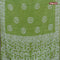 Batik cotton saree green with allover sequin work & batik butta prints and printed lace work border