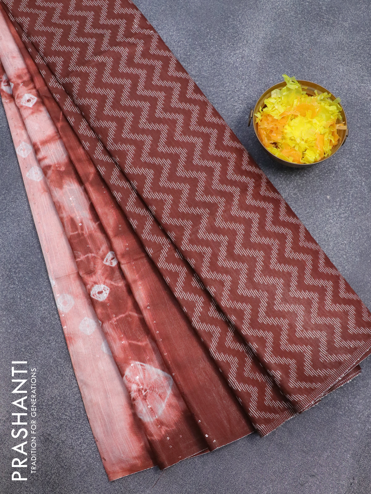 Bamboo silk saree peach shade and brown with allover tie & dye prints & sequin work in borderless style