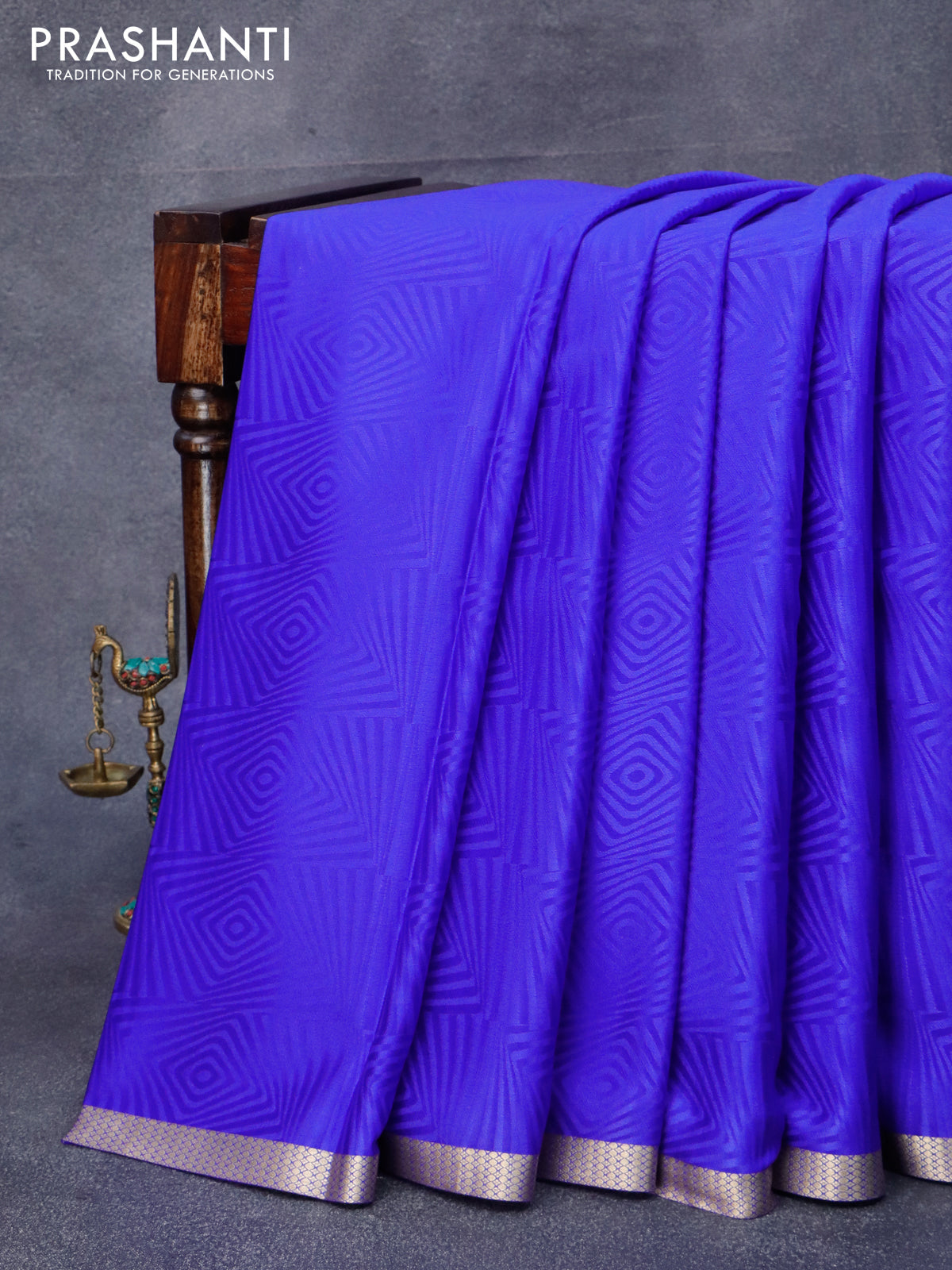 Pure mysore crepe silk saree royal blue with allover self emboss and zari woven border