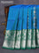 Venkatagiri silk saree dual shade of bluish green and green with allover floral silver zari woven weaves and long peacock design silver zari woven border