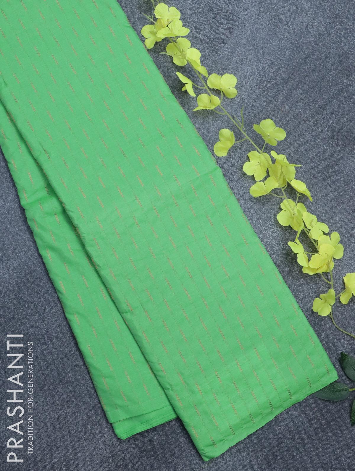 Arani semi silk saree light green with allover copper zari weaves in borderless style