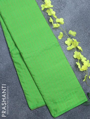 Arani semi silk saree light green with allover copper zari weaves in borderless style