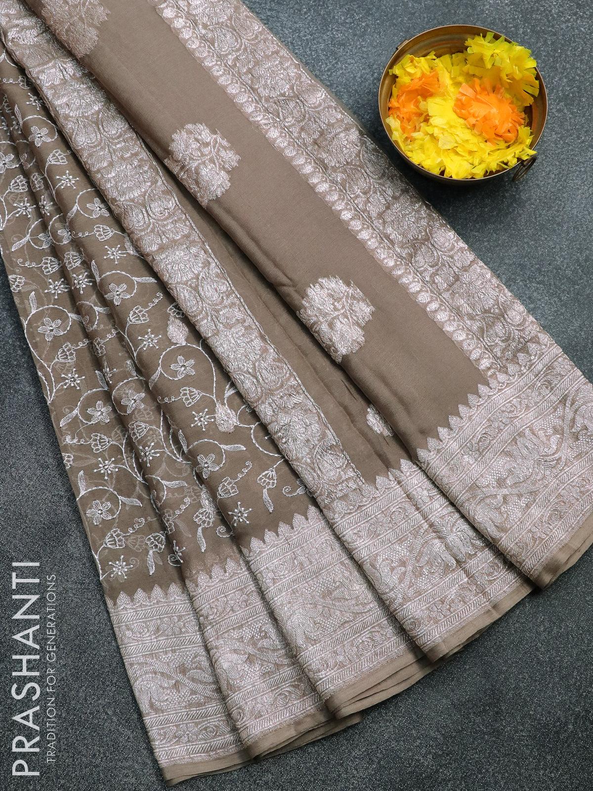 Banarasi chiffon saree grey shade   with allover chikankari work and silver zari woven border