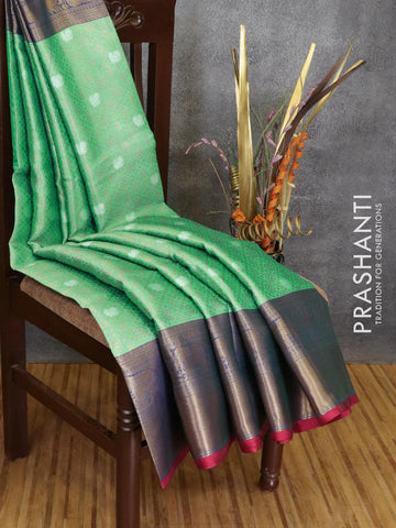 Banarasi kora saree green and blue with allover zari weaves and long zari woven border