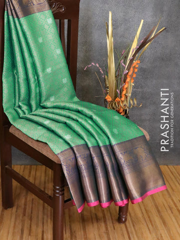 Banarasi kora saree teal green and pink with allover zari weaves and long zari woven border