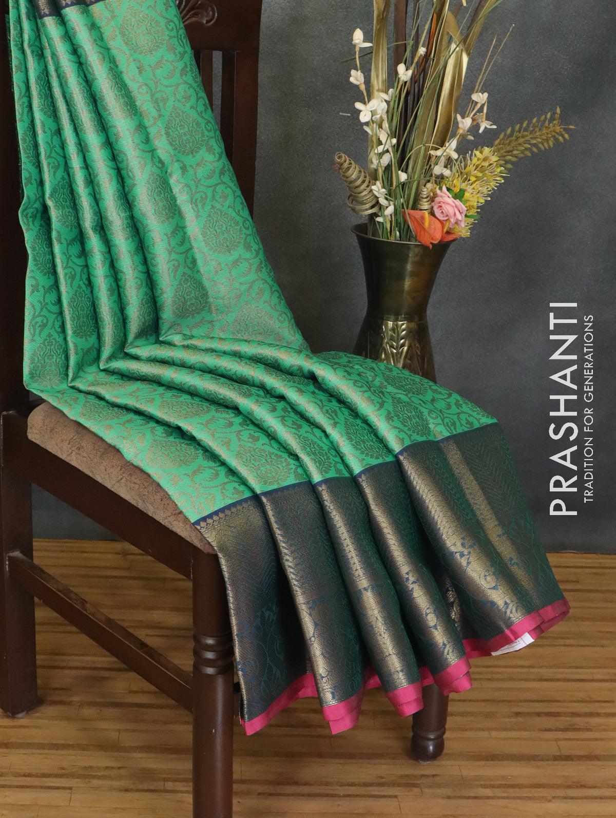 Banarasi kora saree teal green and pink with allover zari weaves and zari woven border