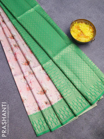 Banarasi softy silk saree pastel peach and green with allover zari weaves & floral digital prints and zari woven border