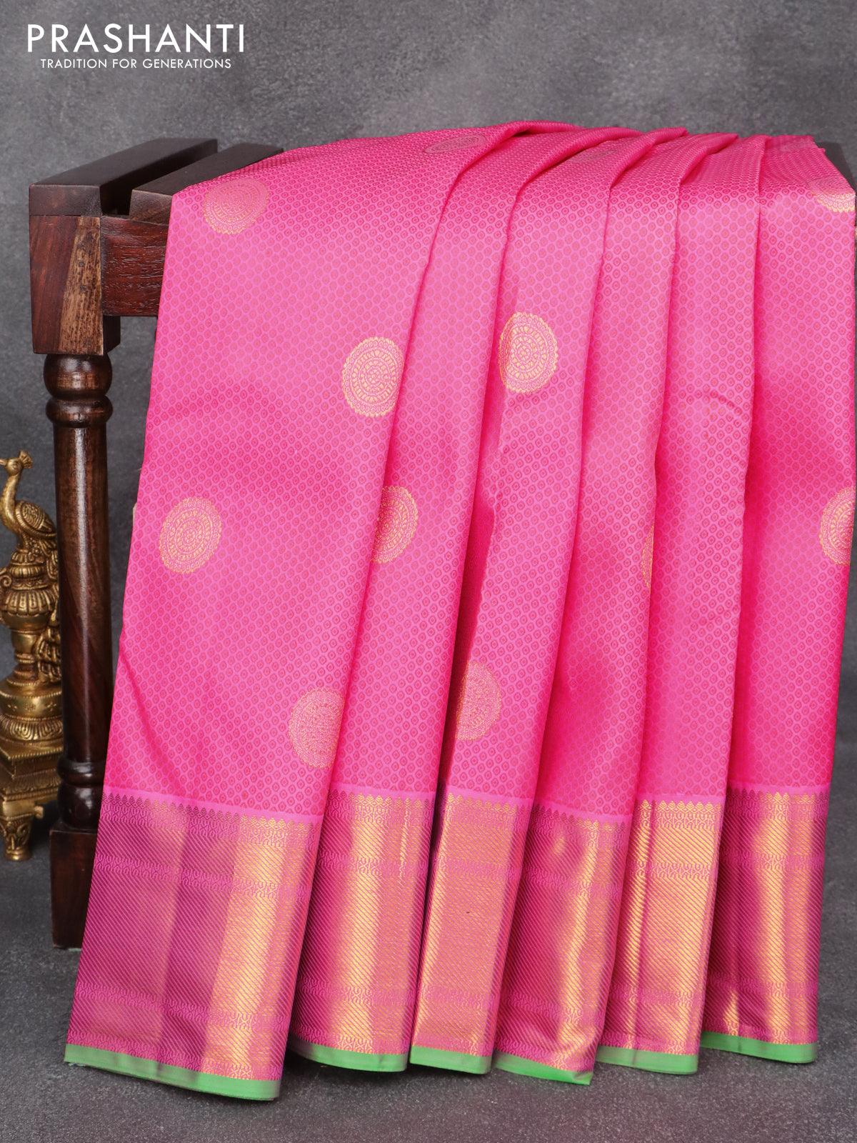 Pure kanjivaram silk saree pink and green with allover self emboss & zari buttas and zari woven border