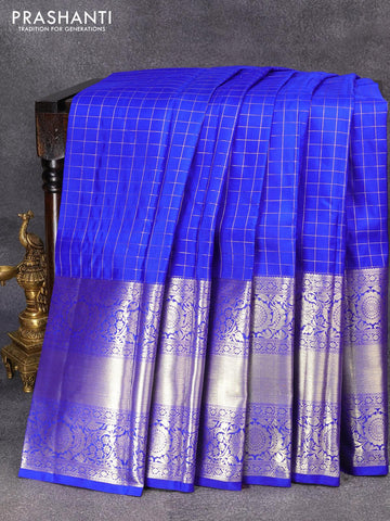 Pure kanjivaram silk saree royal blue with allover line checked pattern and long floral zari woven border