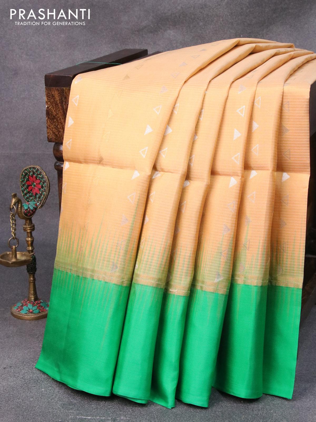 Pure soft silk saree sandal and green with silver & zari geometric weaves and zari woven simple border