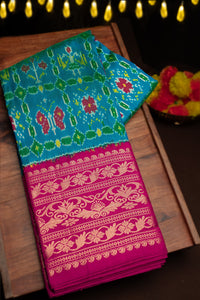 Mandir Teal & Magenta Kanchi Ikat Ikat Saree