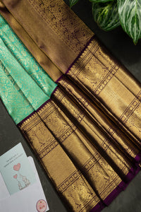 Mandir Sea Green & Magenta Kanchipuram Checks And Buttis Saree